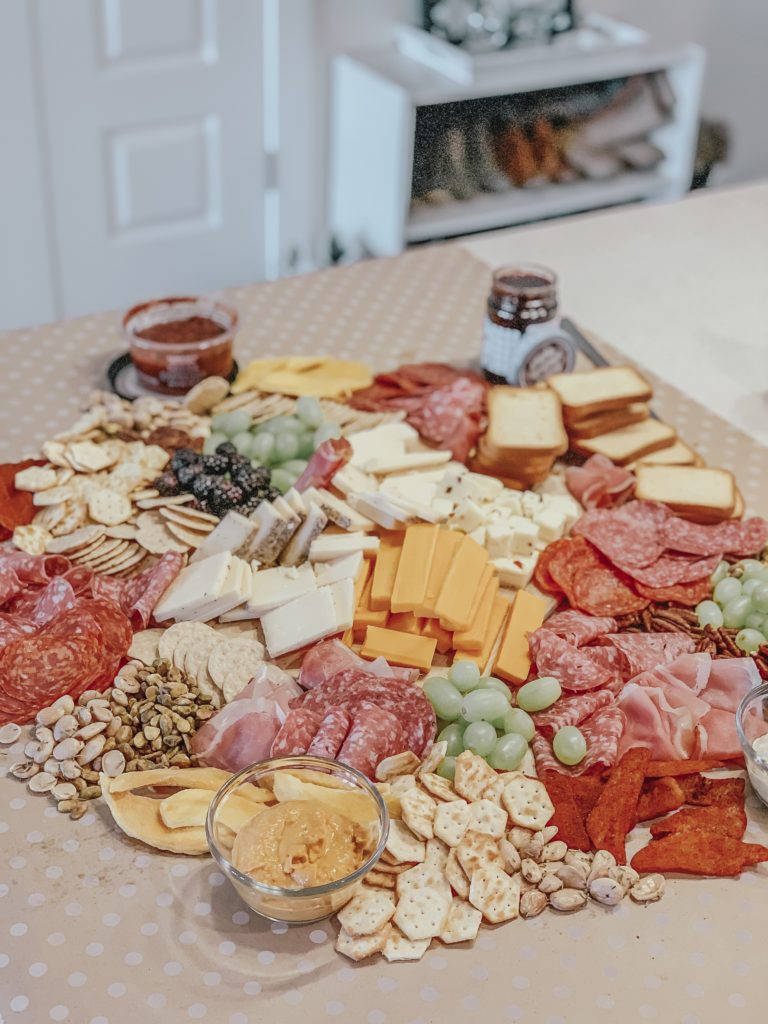 Charcuterie board on butcher paper  Charcuterie inspiration, Party food  buffet, Charcuterie and cheese board